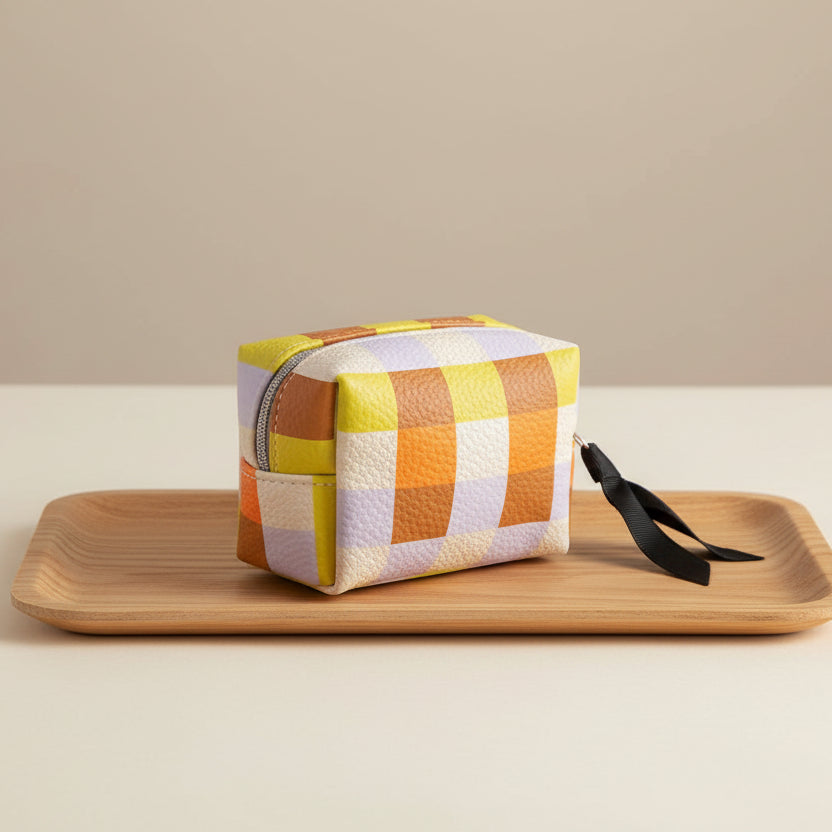 Luxury Caroline Gardner mini cube cosmetic bag, elegant travel organizer with chic design and premium craftsmanship