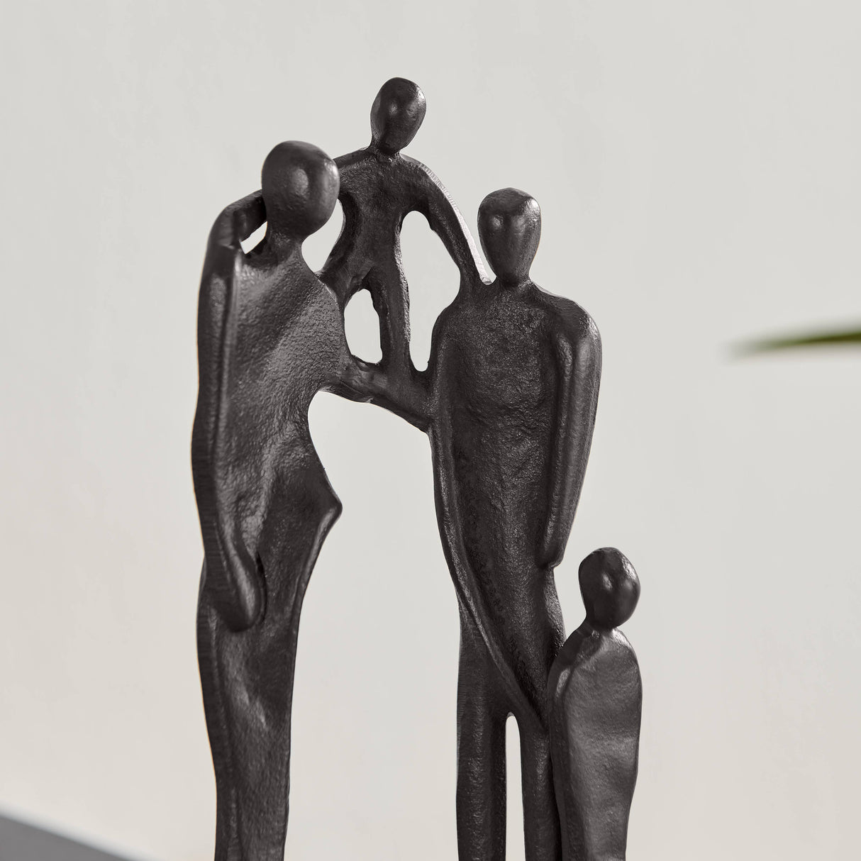 Brown Cast Iron Abstract Family of Four Together Sculpture