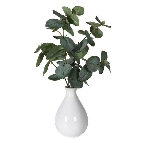 Artificial Eucalyptus in a White Vase.