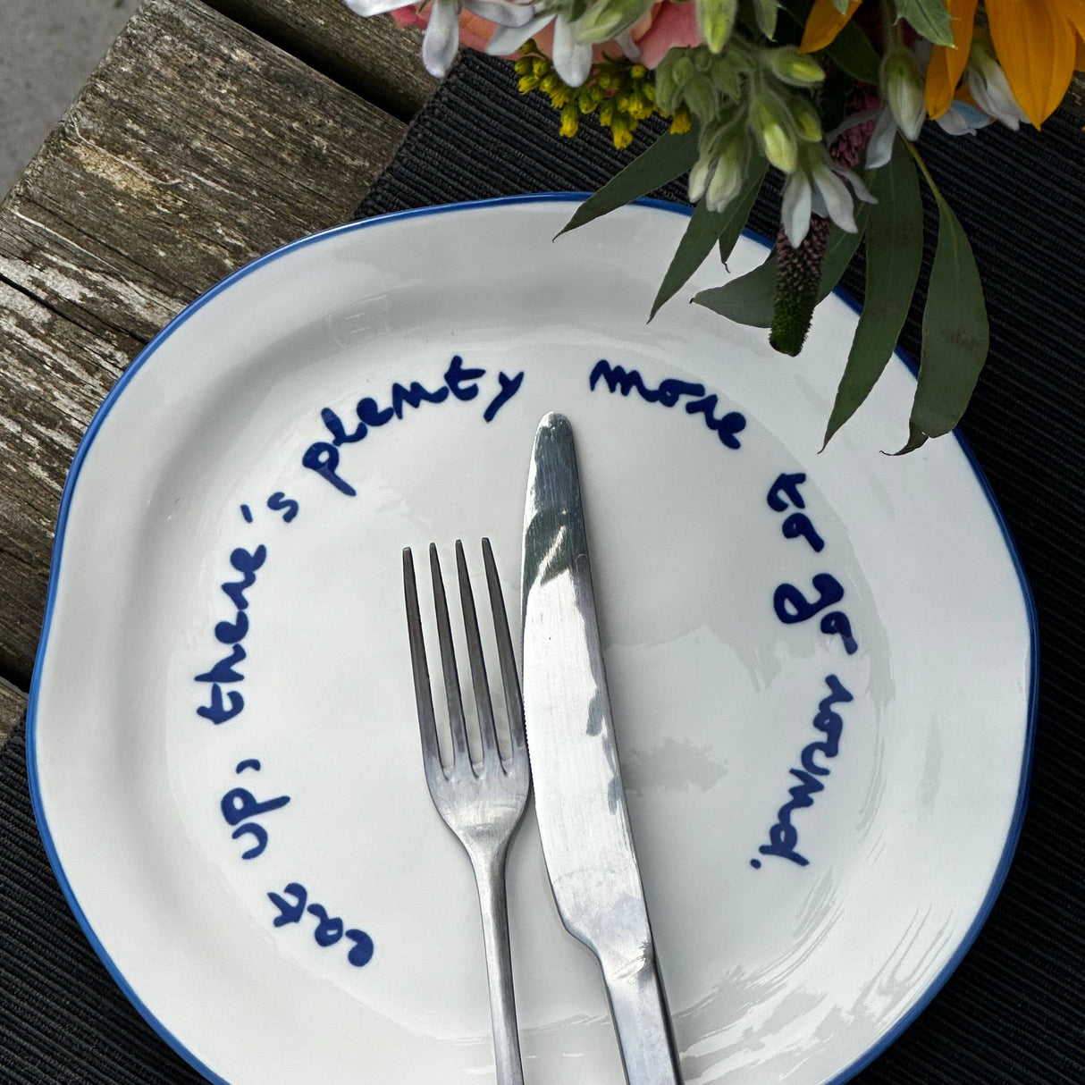 'eat up there's plenty more to go around.' Statement Plate
