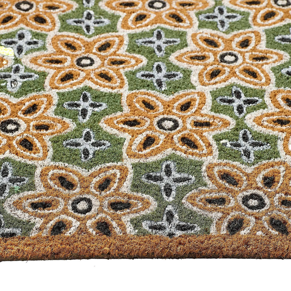 Durable coir doormat designed to trap dirt and enhance entryway cleanliness effectively.