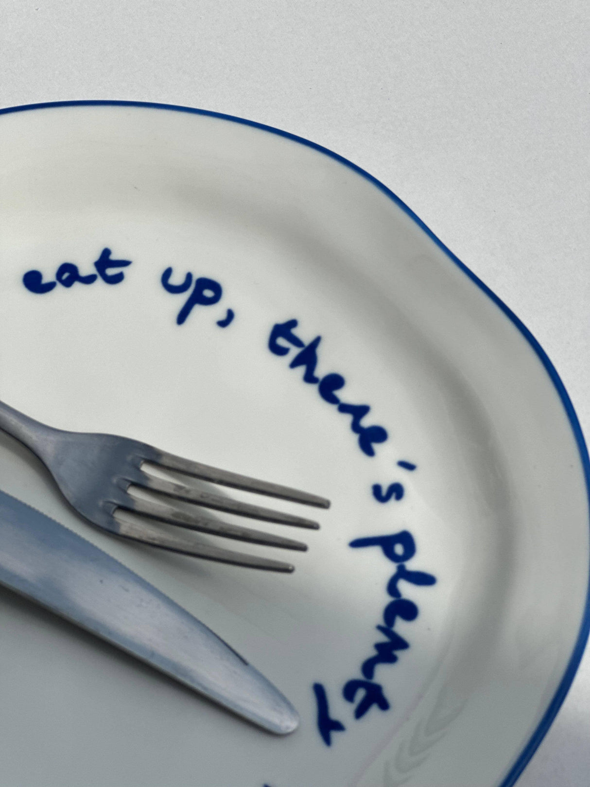 'eat up there's plenty more to go around.' Statement Plate
