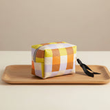 Luxury Caroline Gardner mini cube cosmetic bag, elegant travel organizer with chic design and premium craftsmanship