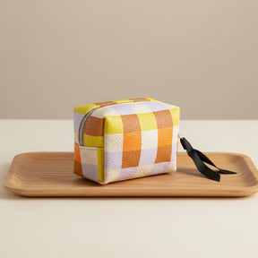 Luxury Caroline Gardner mini cube cosmetic bag, elegant travel organizer with chic design and premium craftsmanship