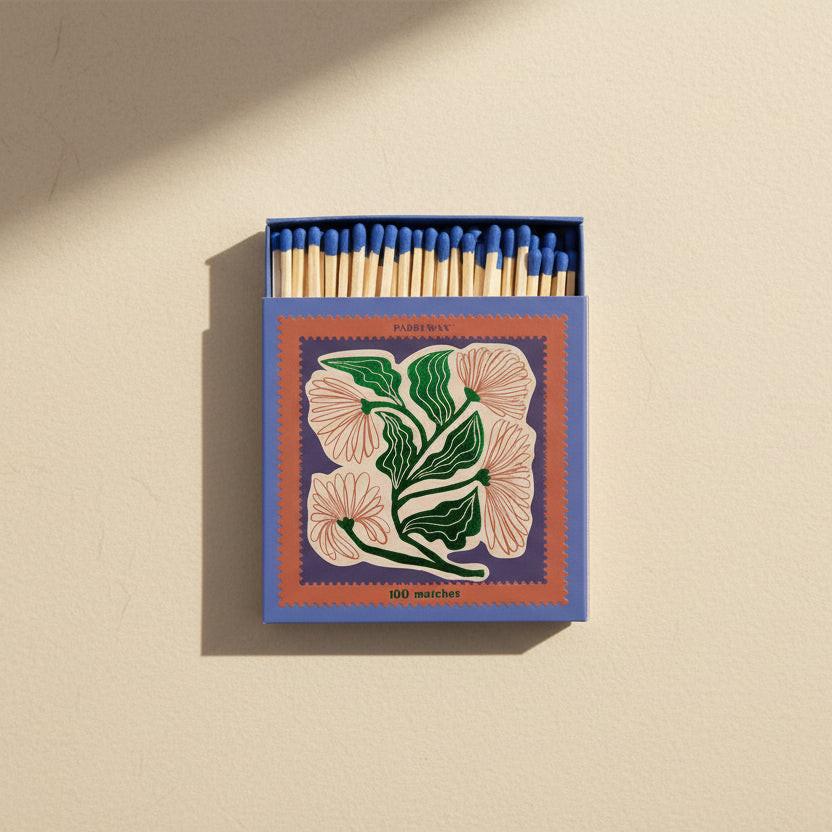 Matches with floral design on the box