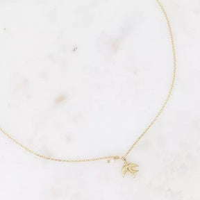 Necklace - bird in flight and small freshwater pearl.