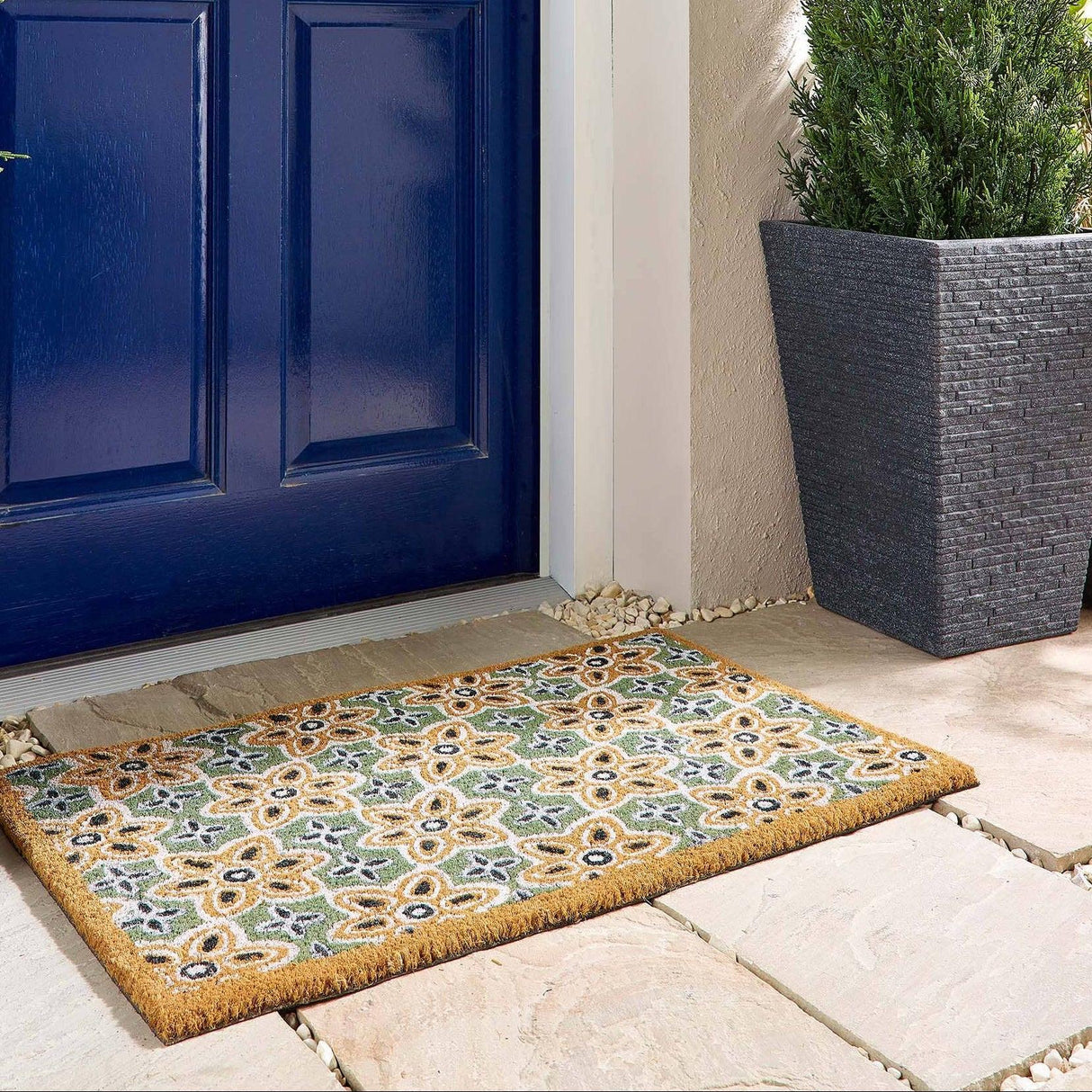Durable coir doormat designed to trap dirt and enhance entryway cleanliness effectively.