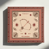 Matches box with decorative design and 'PaddyWax' branding on a white background