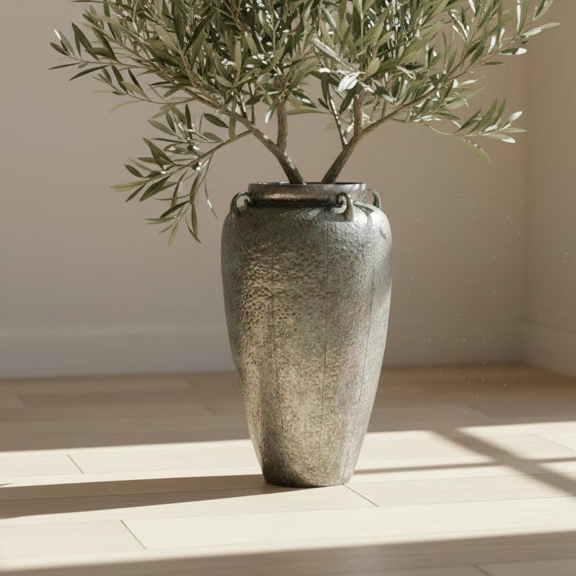 Silver textured vase on a white background