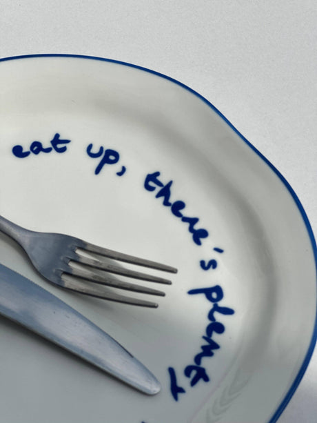 'eat up there's plenty more to go around.' Statement Plate