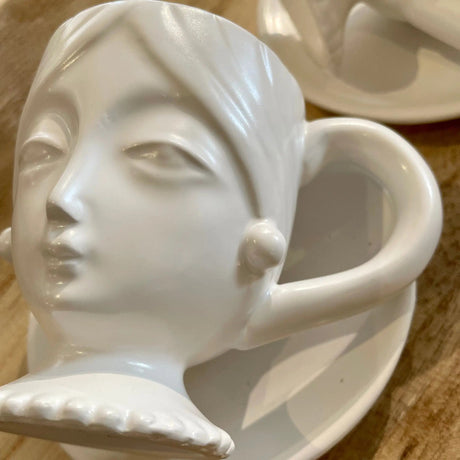 White Face Cup and Saucer.